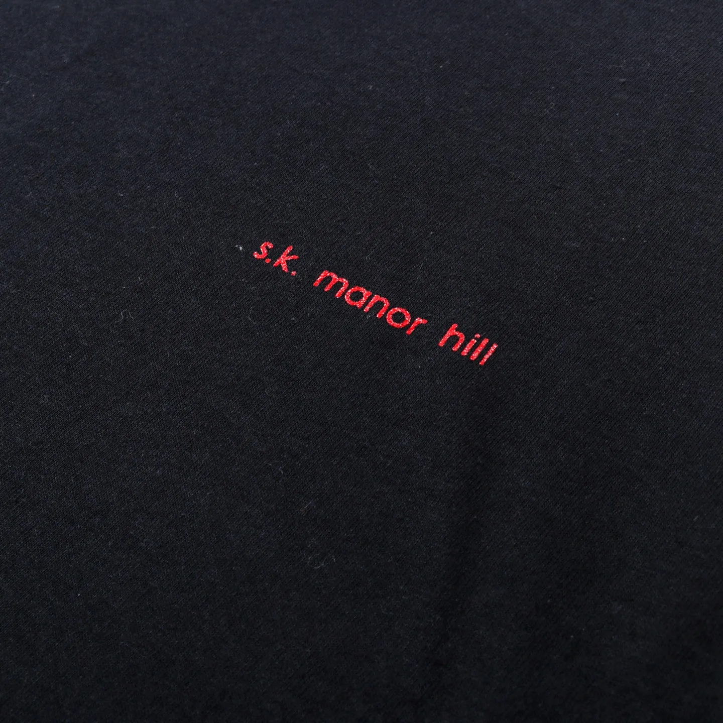 S.K. MANOR HILL LONG SLEEVE LOGO T BLACK